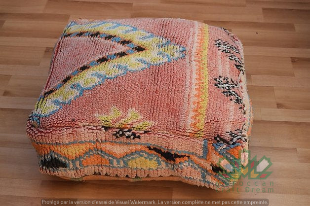 Kilim Moroccan poufs and ottomans made from rug and wool material, featuring vibrant patterns and traditional craftsmanship for stylish decor.