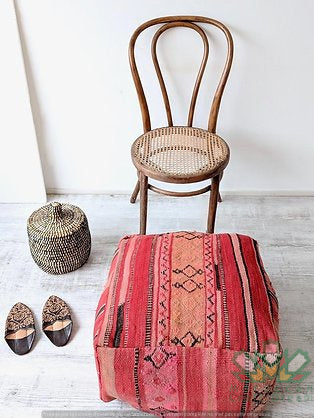 Kilim Moroccan poufs and ottomans made from rug and wool material, featuring vibrant patterns and traditional craftsmanship for stylish decor.