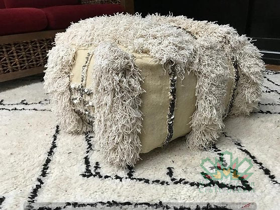 Kilim Moroccan poufs and ottomans made from rug and wool material, featuring vibrant patterns and traditional craftsmanship for stylish decor.