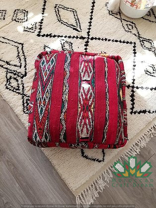 Kilim Moroccan poufs and ottomans made from rug and wool material, featuring vibrant patterns and traditional craftsmanship for stylish decor.
