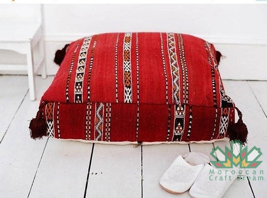 Kilim Moroccan poufs and ottomans made from rug and wool material, featuring vibrant patterns and traditional craftsmanship for stylish decor.