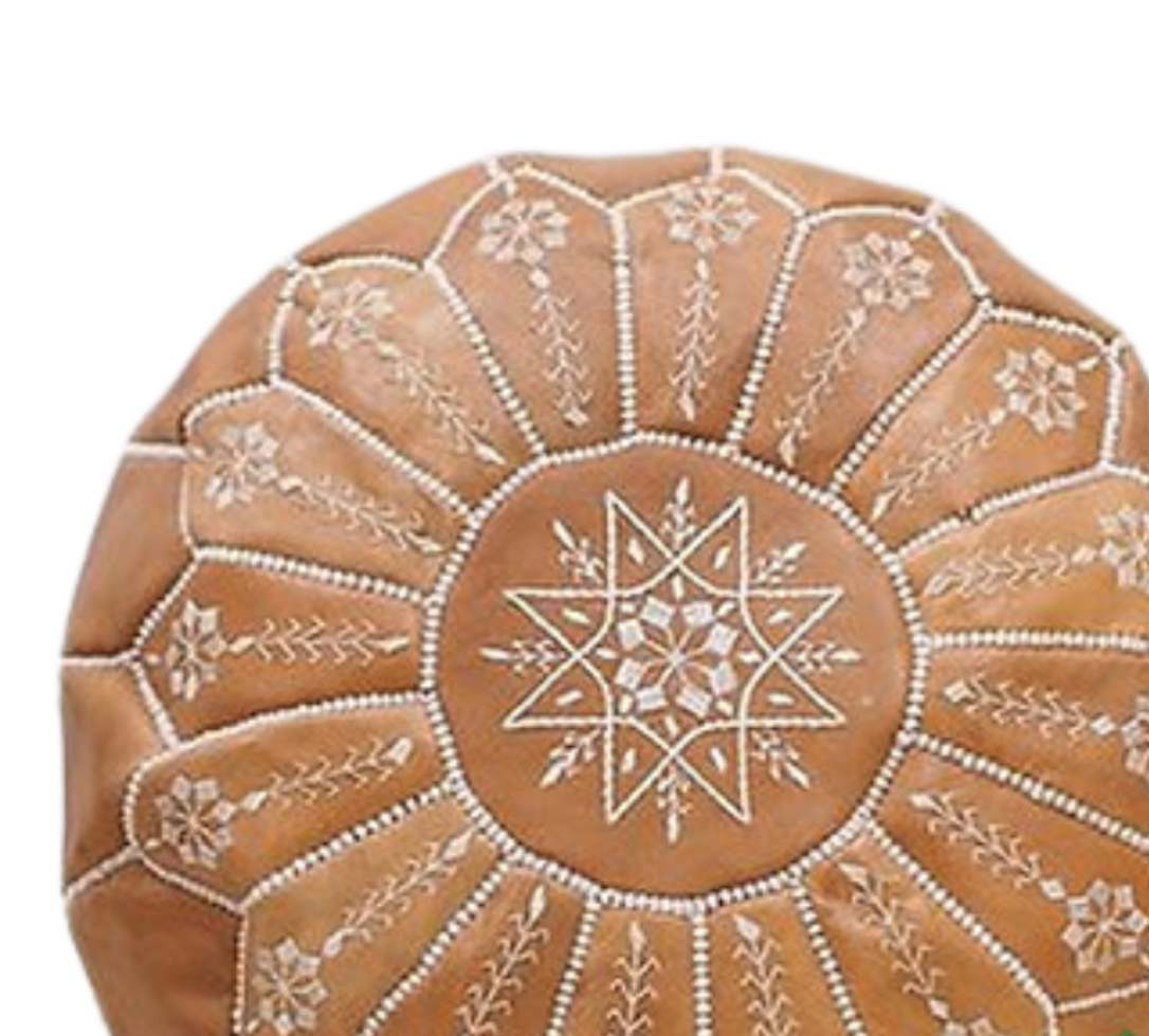 Moroccan pouf ottomanHandcrafted Moroccan leather poufs, ottomans and footstool in natural tones, featuring traditional stitching and soft, durable materials.