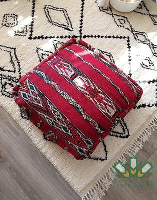 Kilim Moroccan poufs and ottomans made from rug and wool material, featuring vibrant patterns and traditional craftsmanship for stylish decor.