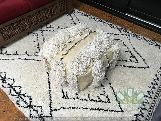 Kilim Moroccan poufs and ottomans made from rug and wool material, featuring vibrant patterns and traditional craftsmanship for stylish decor.