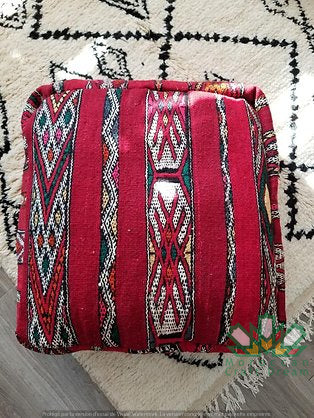 Kilim Moroccan poufs and ottomans made from rug and wool material, featuring vibrant patterns and traditional craftsmanship for stylish decor.