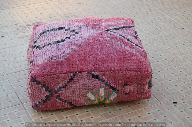 Kilim Moroccan poufs and ottomans made from rug and wool material, featuring vibrant patterns and traditional craftsmanship for stylish decor.