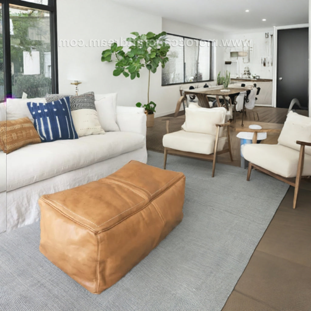 Large tobacco light caramel tabac Leather coffee table ottoman, an elegant and practical choice for enhancing home decor and seating options.