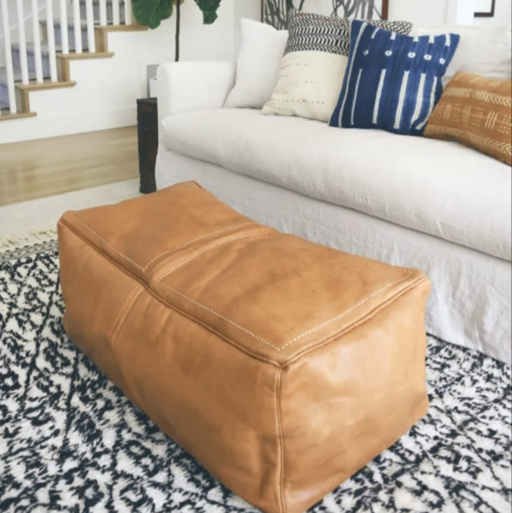 Large tobacco light caramel tabac Square large leather coffee table ottoman, a versatile decor piece that suits contemporary and traditional styles.