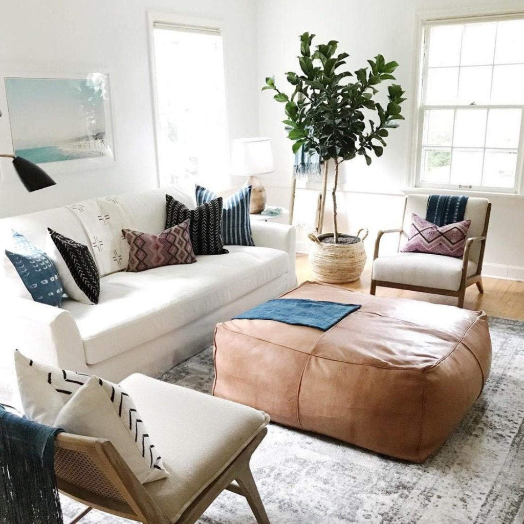 Large light caramel simpy Square leather coffee table ottoman, handcrafted for a unique and functional addition to home decor.