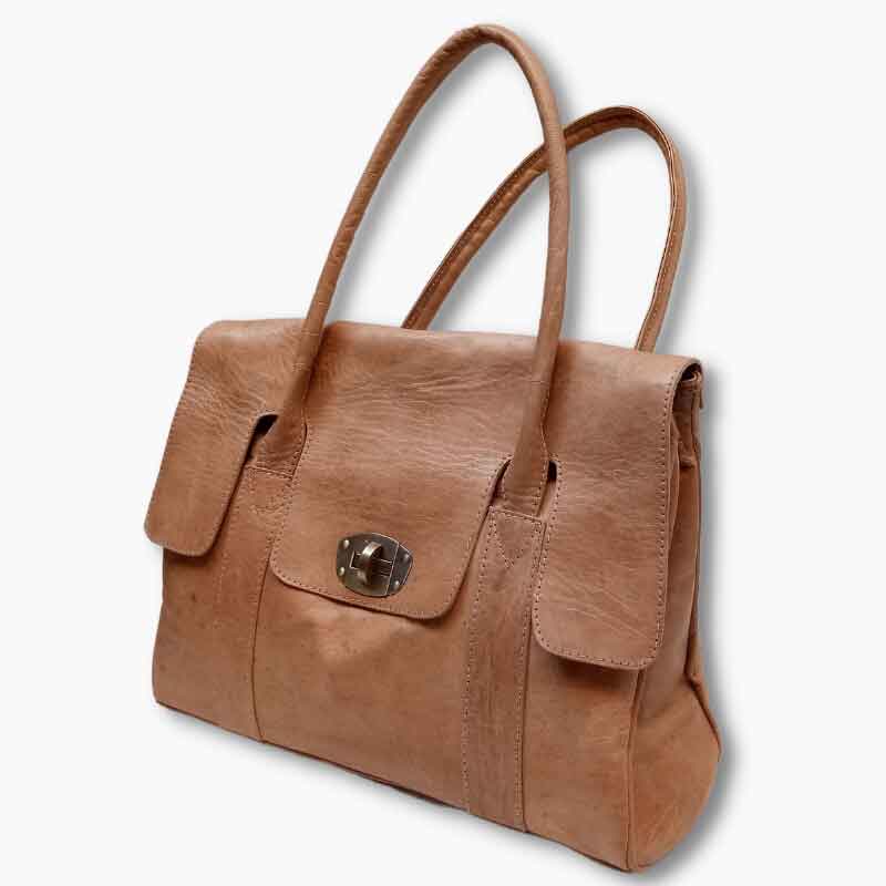 Handcrafted Moroccan leather bag purse in natural brown, featuring traditional stitching and a minimalist design, made from eco-friendly materials