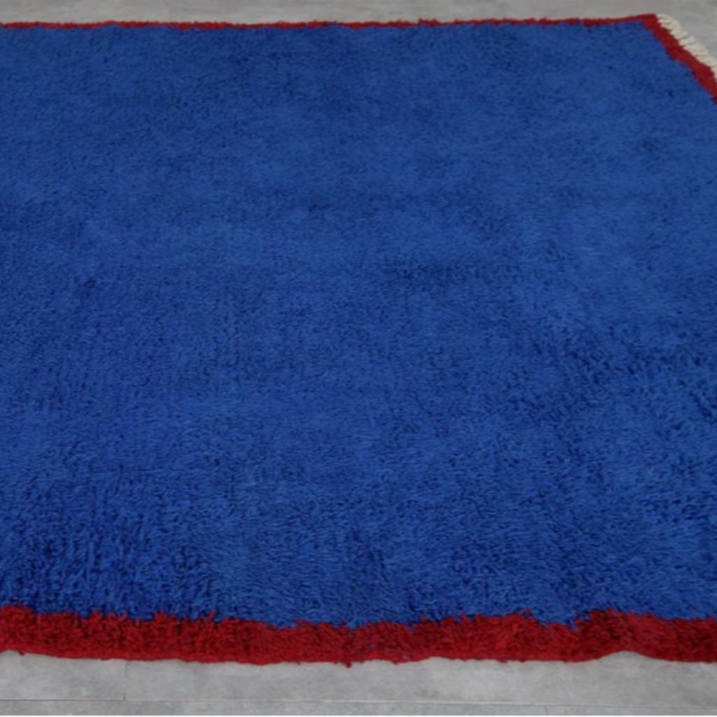 Handmade bohemian rug from Morocco showcasing traditional craftsmanship and charm.
