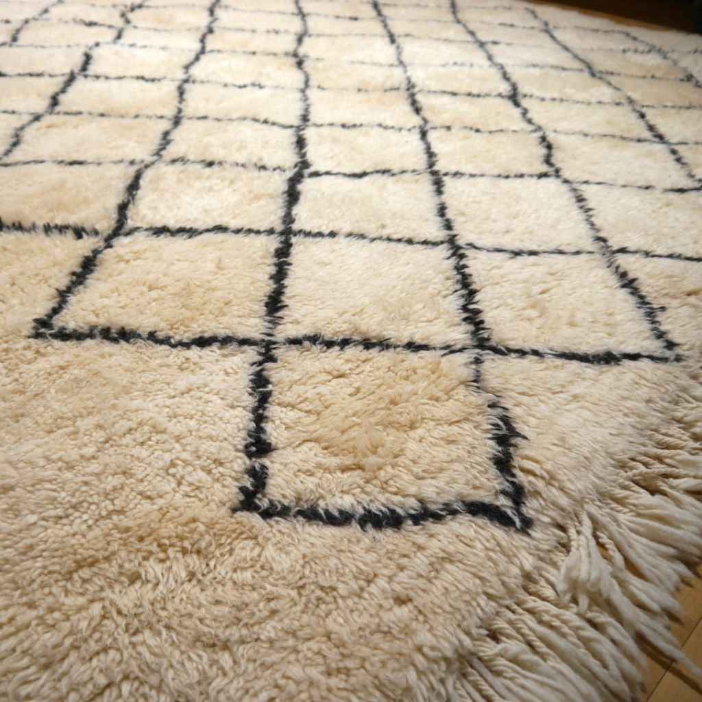 Berber area rugs and Moroccan carpets featuring traditional designs, handcrafted from high-quality materials for authentic home decor.