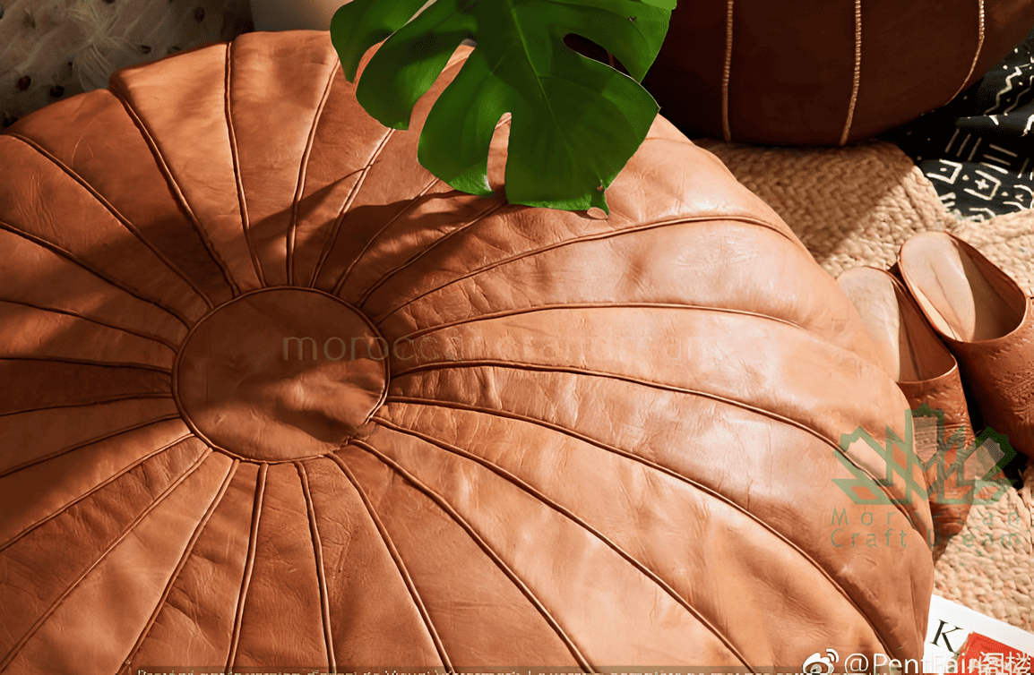 Caramel Round Authentic Moroccan leather pouf ottoman, handcrafted for use as a coffee table or footrest in any home decor.