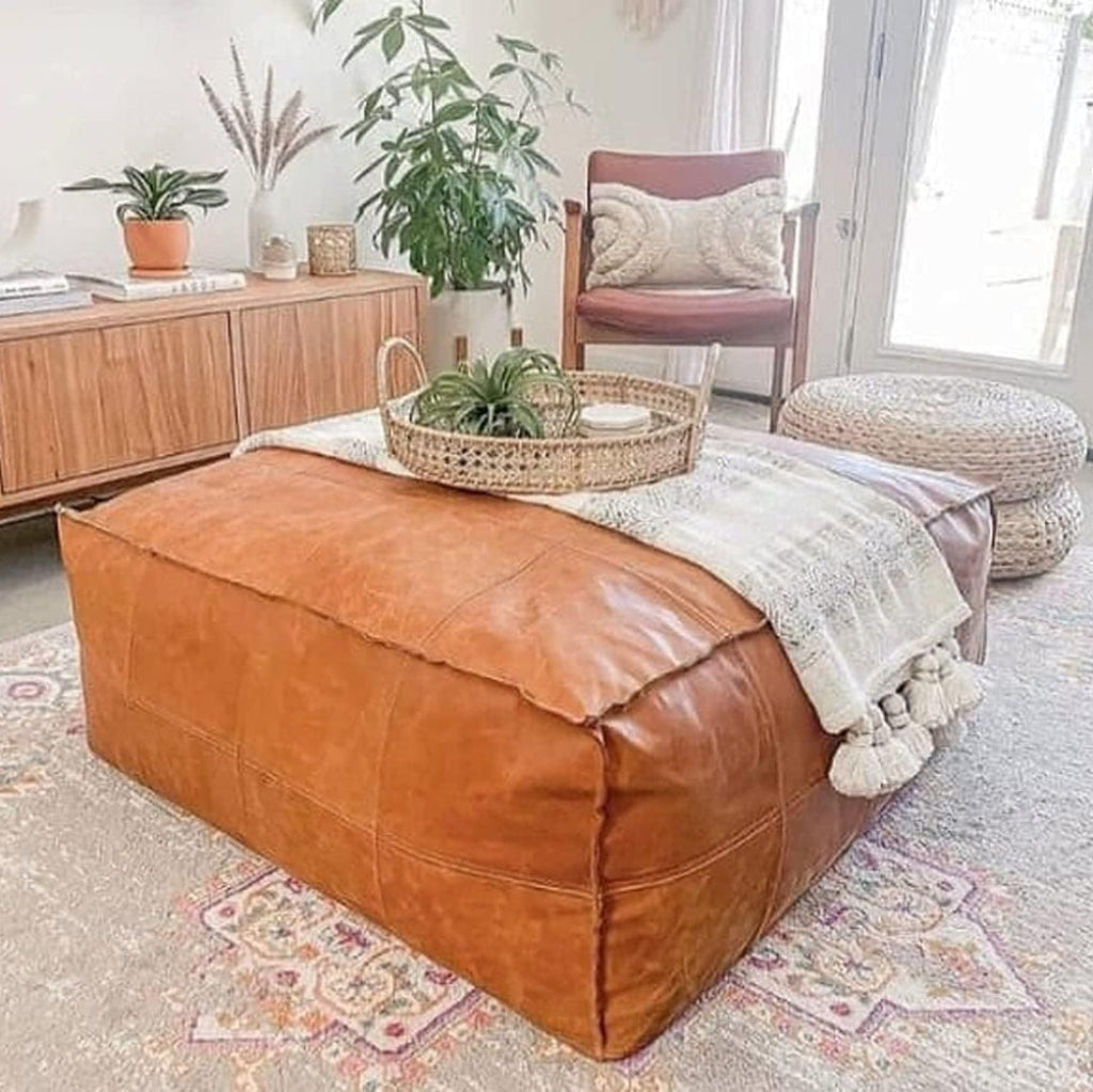 caramel larhge pouf leather coffee table available in square & rectangulare shapes, ideal for boho and modern home decor
