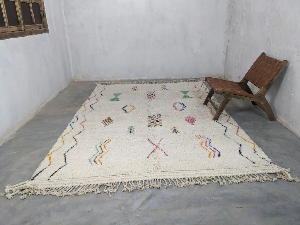 Moroccan boho carpet handcrafted by artisans with unique tribal-inspired motifs.