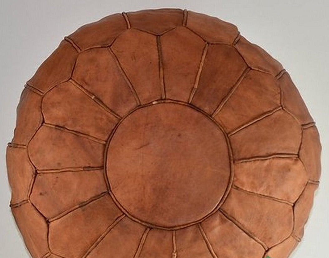 Light caramel Moroccan leather pouf ottoman by Moroccancraftdream qwithout star patern, ideal for living room or bedroom decor.
