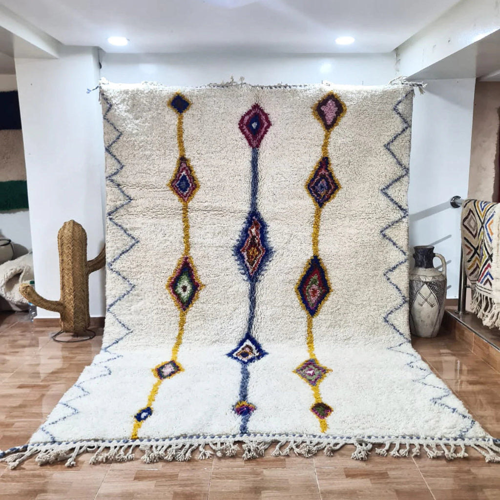 Berber area rugs and Moroccan carpets featuring traditional designs, handcrafted from high-quality materials for authentic home decor.