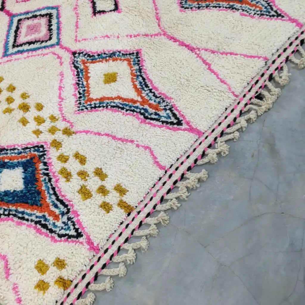 Berber area rugs and Moroccan carpets featuring traditional designs, handcrafted from high-quality materials for authentic home decor.