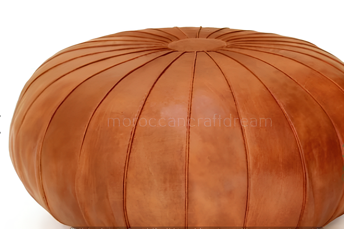 Caramel Round Handcrafted Moroccan leather pouf for living room decor, blending comfort with authentic Moroccan style.