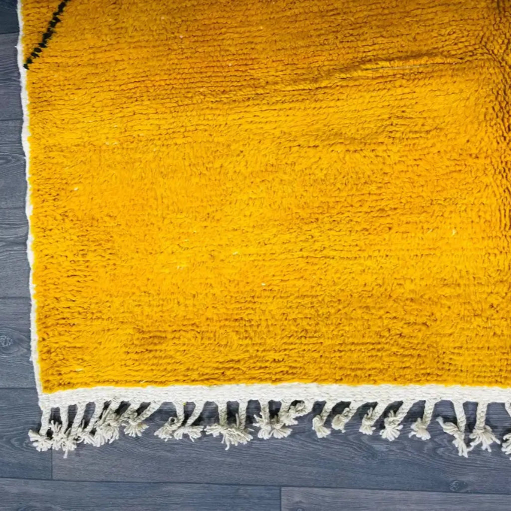 Berber area rugs and Moroccan carpets featuring traditional designs, handcrafted from high-quality materials for authentic home decor.