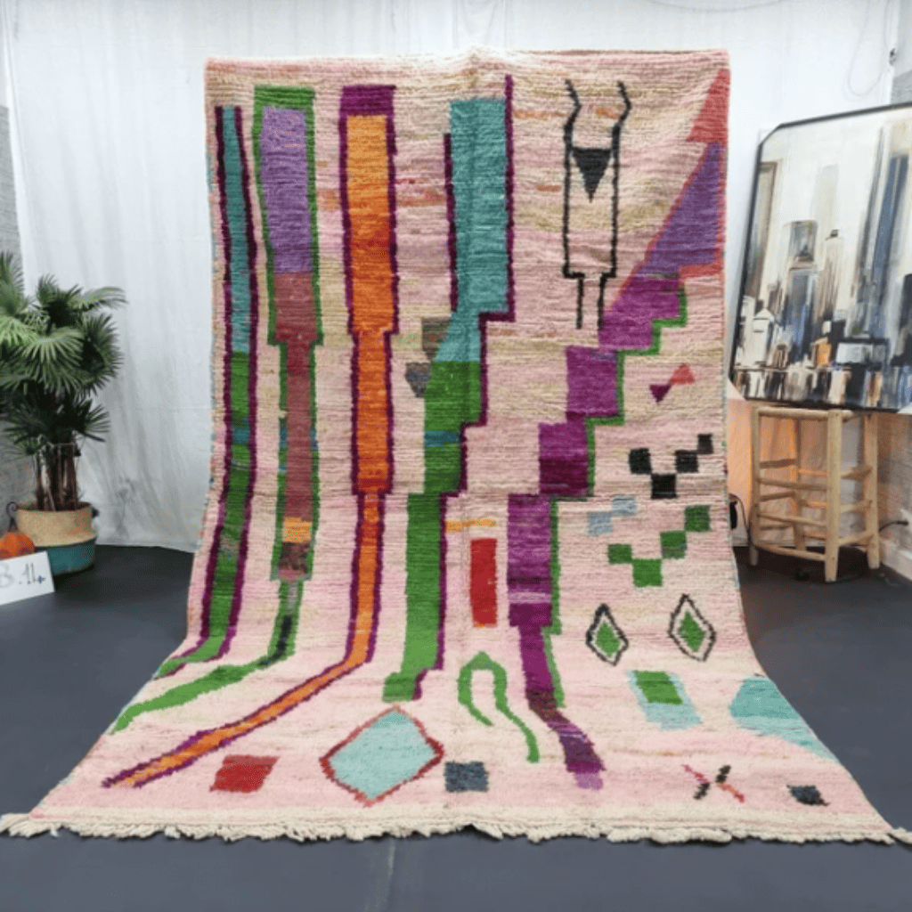 Berber area rugs and Moroccan carpets featuring traditional designs, handcrafted from high-quality materials for authentic home decor.