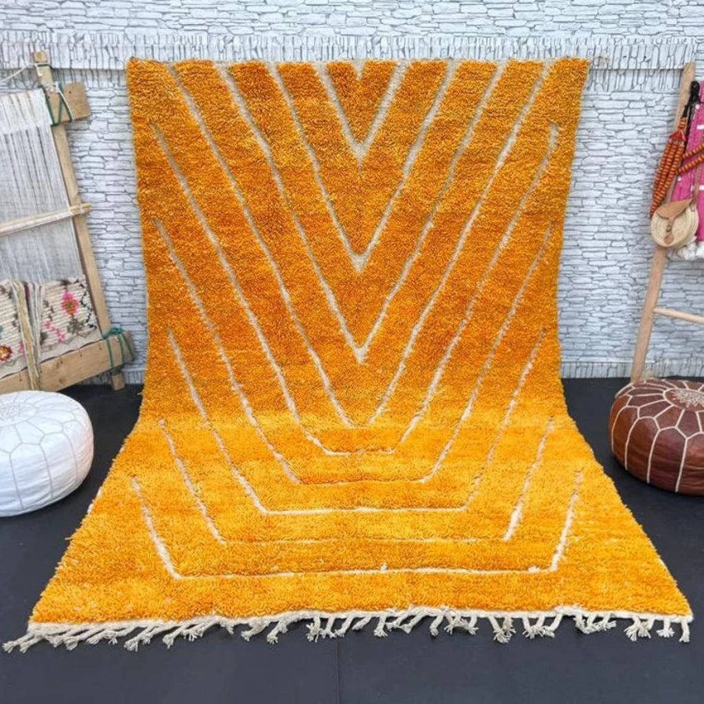 Berber area rugs and Moroccan carpets featuring traditional designs, handcrafted from high-quality materials for authentic home decor.