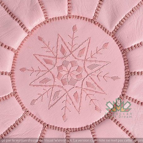 Handcrafted leather Moroccan poufs, ottomans and footstool in natural tones, featuring traditional stitching and soft, durable materials.
