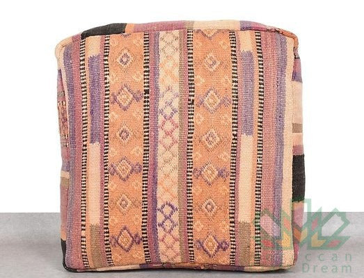 Kilim Moroccan poufs and ottomans made from rug and wool material, featuring vibrant patterns and traditional craftsmanship for stylish decor.