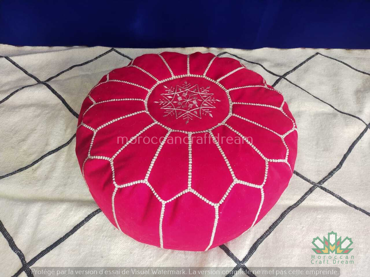 Moroccan poufs and ottomans footstool used as a coffee table, handcrafted in wool and velvet with traditional stitching and durable design