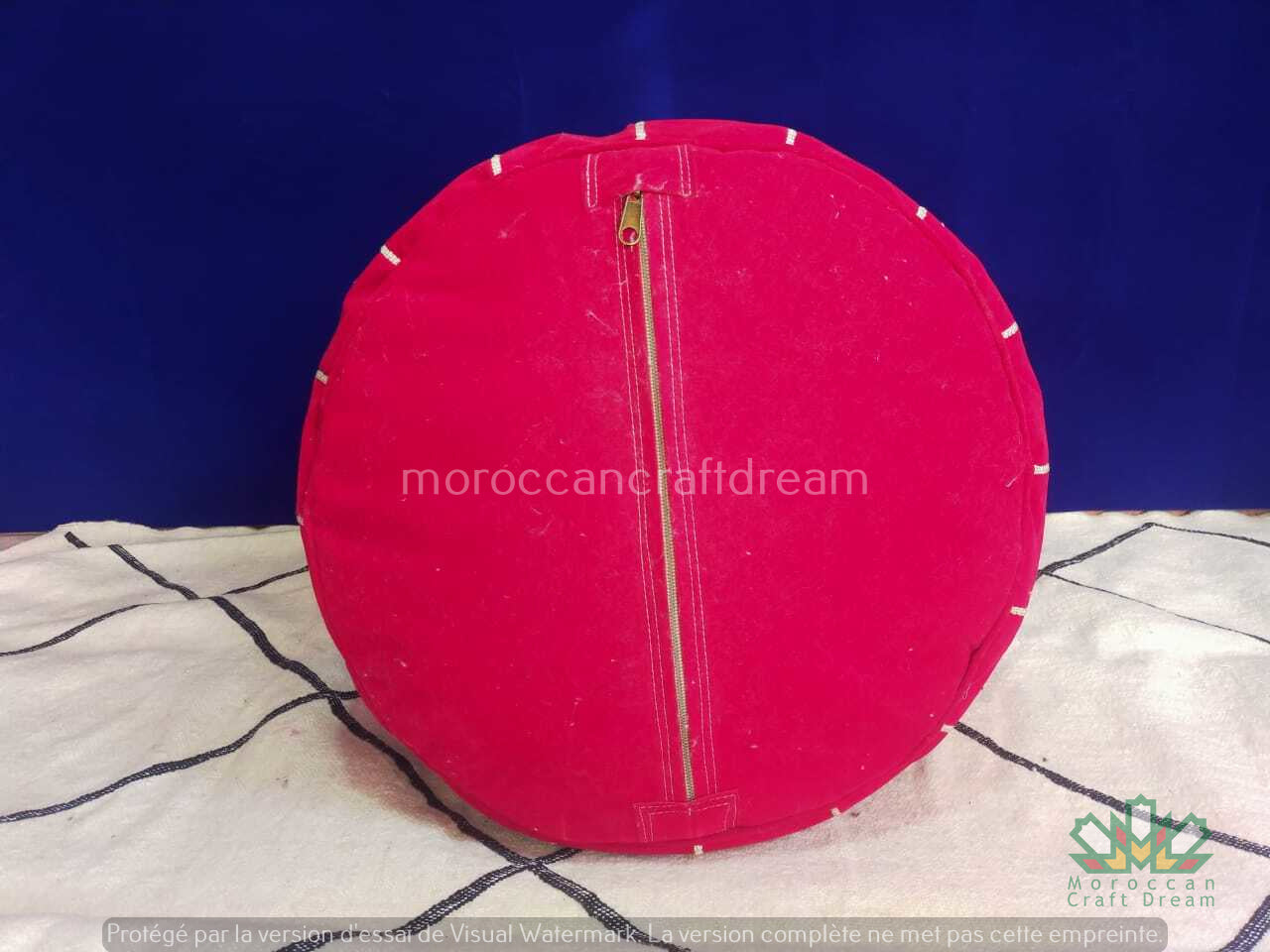 Moroccan poufs and ottomans footstool used as a coffee table, handcrafted in wool and velvet with traditional stitching and durable design