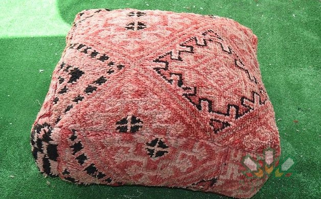 Kilim Moroccan poufs and ottomans made from rug and wool material, featuring vibrant patterns and traditional craftsmanship for stylish decor.