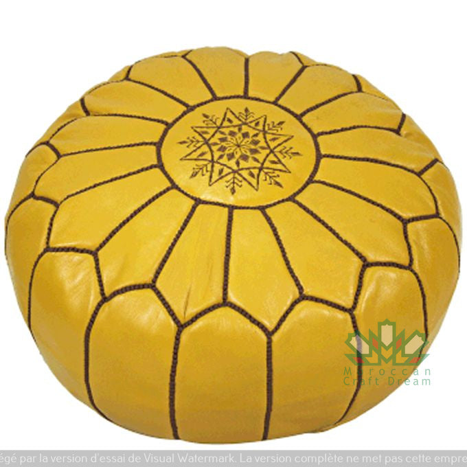 Handcrafted Moroccan leather poufs, ottomans and footstool in natural tones, featuring traditional stitching and soft, durable materials.