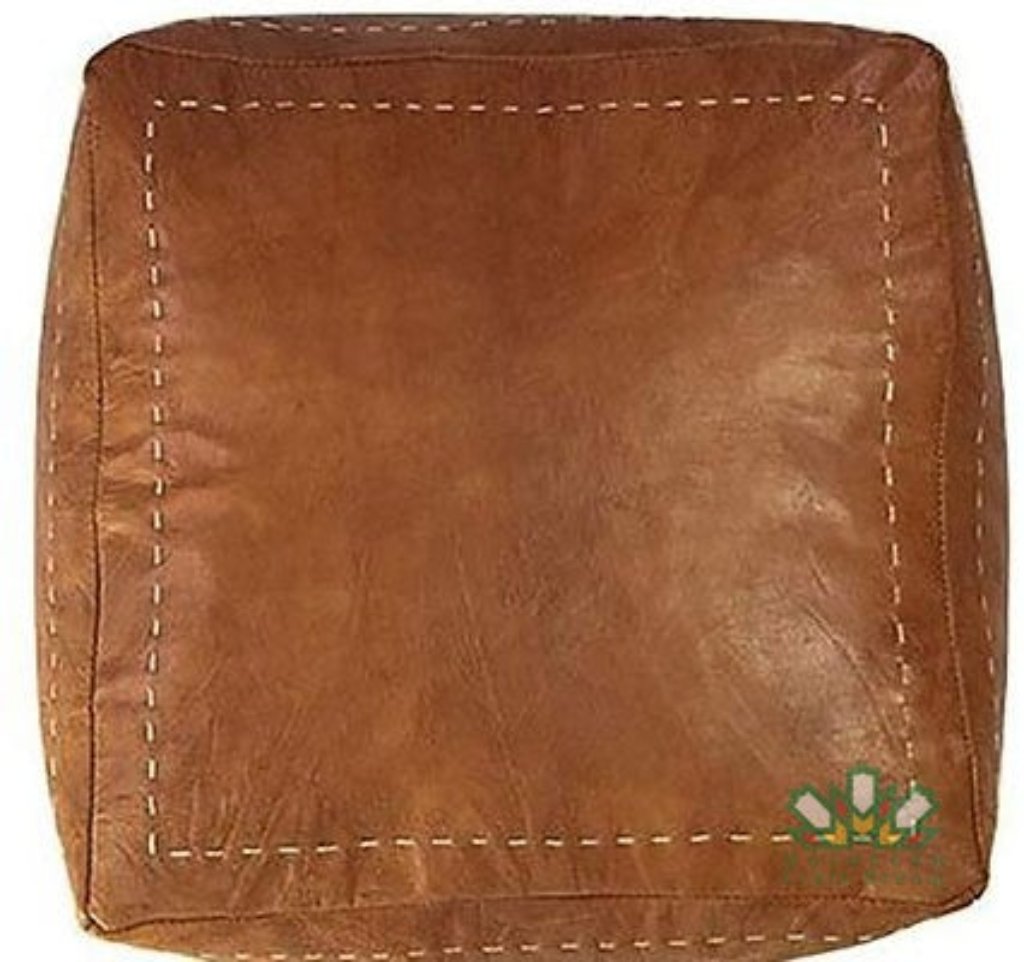 Handcrafted Moroccan leather poufs, ottomans and footstool in natural tones, featuring traditional stitching and soft, durable materials.