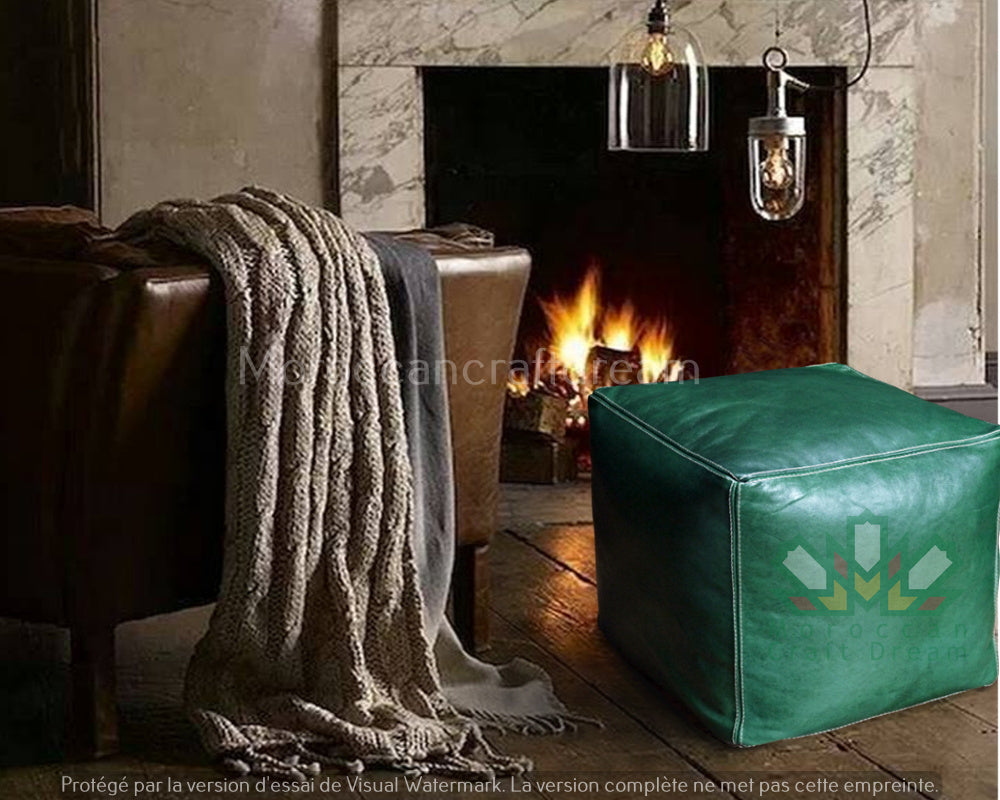 Handcrafted leather Moroccan poufs, ottomans and footstool in natural tones, featuring traditional stitching and soft, durable materials.