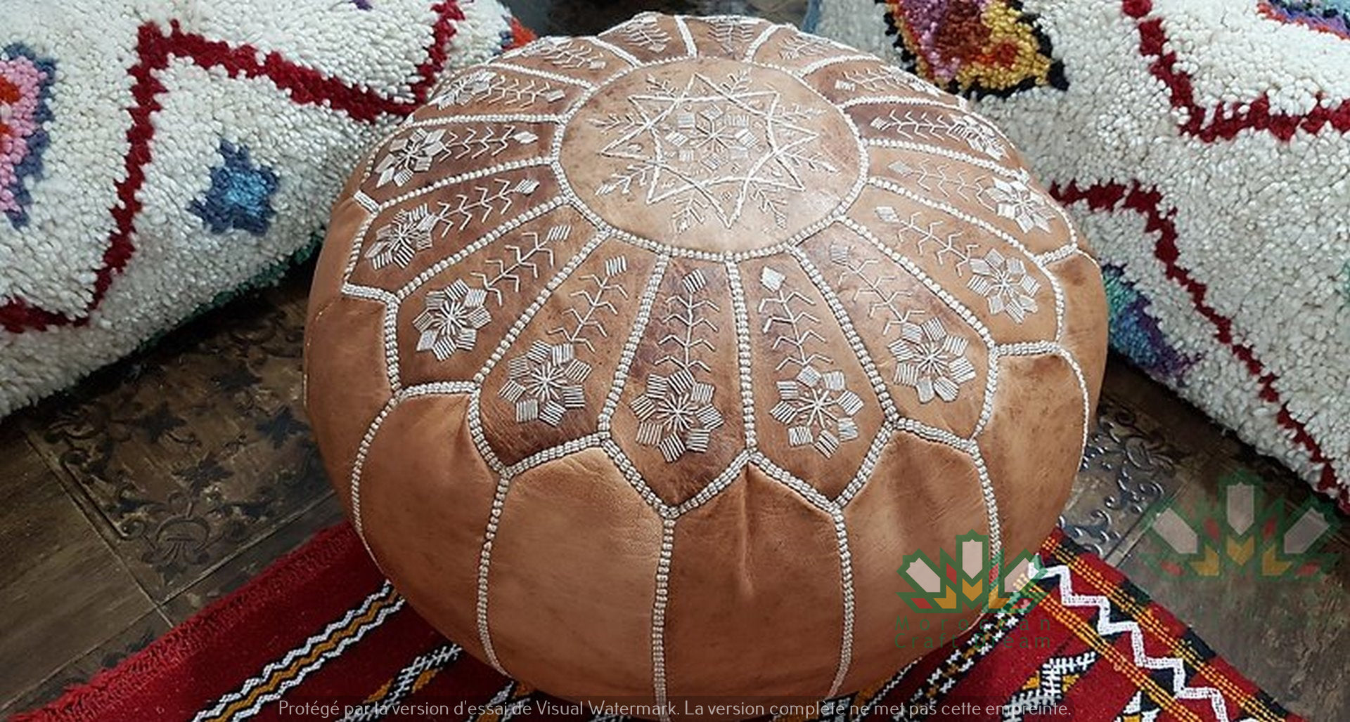 Handcrafted Moroccan leather poufs, ottomans and footstool in natural tones, featuring traditional stitching and soft, durable materials.