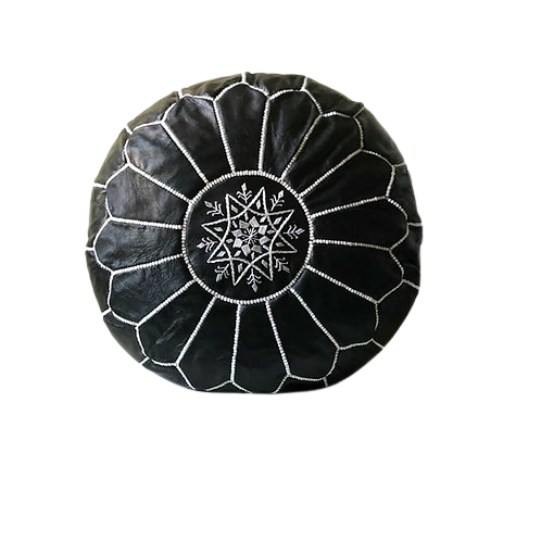 Black handmade round Moroccan pouf ottoman in genuine leather, perfect for use as a versatile coffee table or footrest. This Moroccan leather ottoman enhances living room decor with its elegant design and multifunctional use. Crafted from high-quality leather, Moroccancraftdream's leather poufs offer a stylish and practical solution for modern living spaces. Ideal for use as a coffee table or seating, this round pouf adds a touch of sophistication to any room