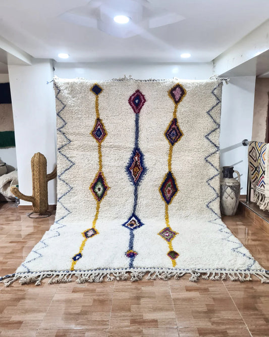 Berber area rugs and Moroccan carpets featuring traditional designs, handcrafted from high-quality materials for authentic home decor.