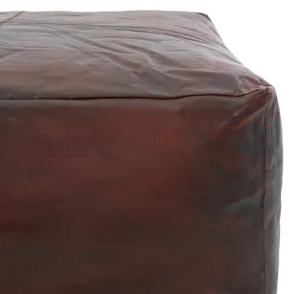 Square and rectangular Moroccan leather poufs used as coffee table ottomans, handcrafted with traditional stitching and durable materials