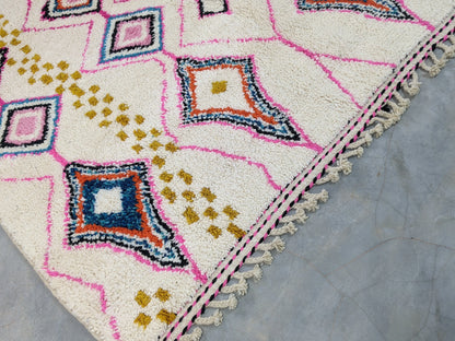 Berber area rugs and Moroccan carpets featuring traditional designs, handcrafted from high-quality materials for authentic home decor.