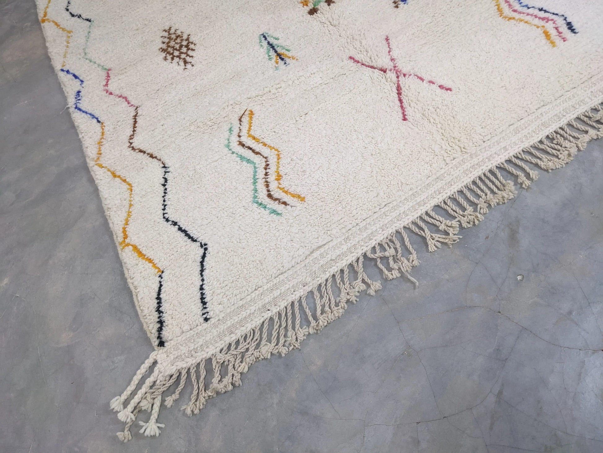 Berber area rugs and Moroccan carpets featuring traditional designs, handcrafted from high-quality materials for authentic home decor.