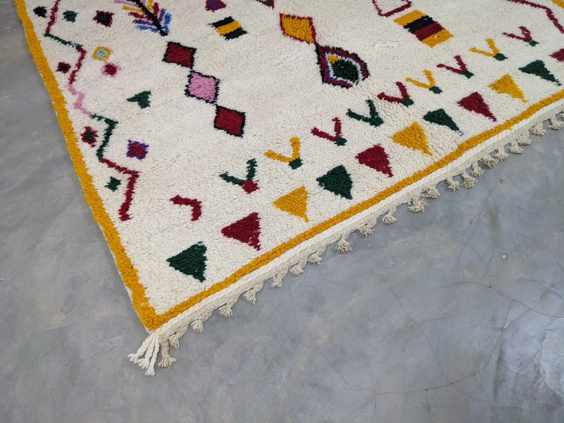 Berber area rugs and Moroccan carpets featuring traditional designs, handcrafted from high-quality materials for authentic home decor.