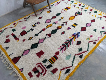 Berber area rugs and Moroccan carpets featuring traditional designs, handcrafted from high-quality materials for authentic home decor.