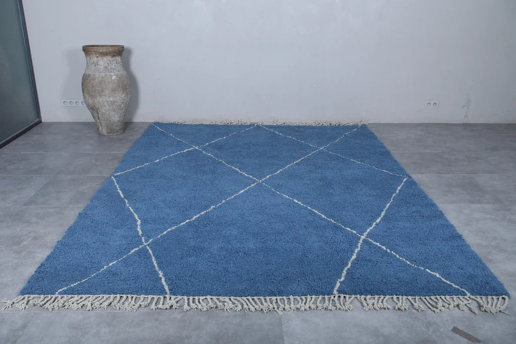 Berber area rugs and Moroccan carpets featuring traditional designs, handcrafted from high-quality materials for authentic home decor.