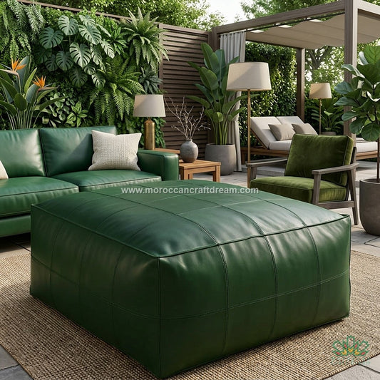 Green leather ottoman in a living room setting with a plants and furniture.