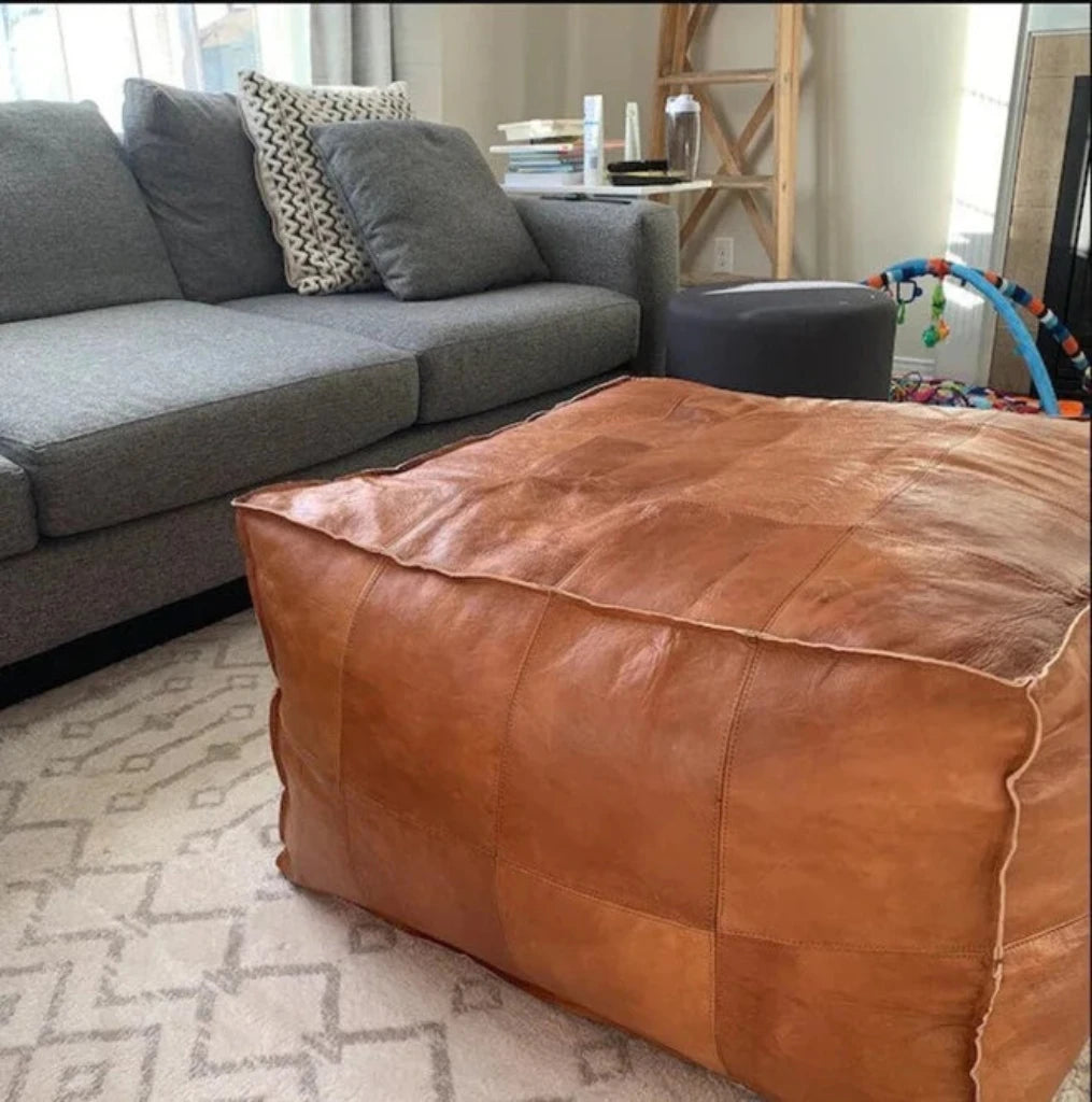 Square and rectangular Light caramel darky Leather ottoman coffee table, an elegant and practical choice for enhancing home decor and seating options.