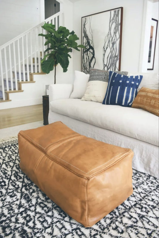 Large tobacco light caramel tabac Square large leather coffee table ottoman, a versatile decor piece that suits contemporary and traditional styles.