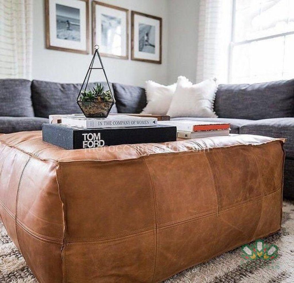 Handmade light caramel darky large leather ottoman coffee table, designed to enhance any living room with style and functionality