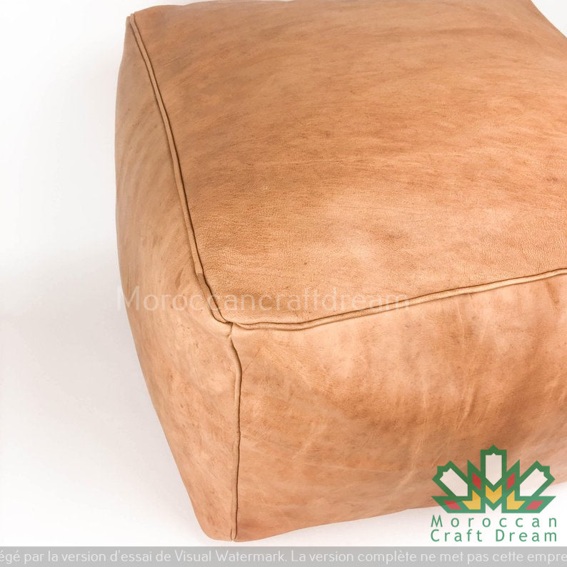 Square and rectangular Moroccan light caramel natural Unique Moroccan leather pouf, designed for a lounge decor that combines comfort and elegance.