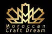Logo of Moroccan Craft Dream with a gold design on a black background