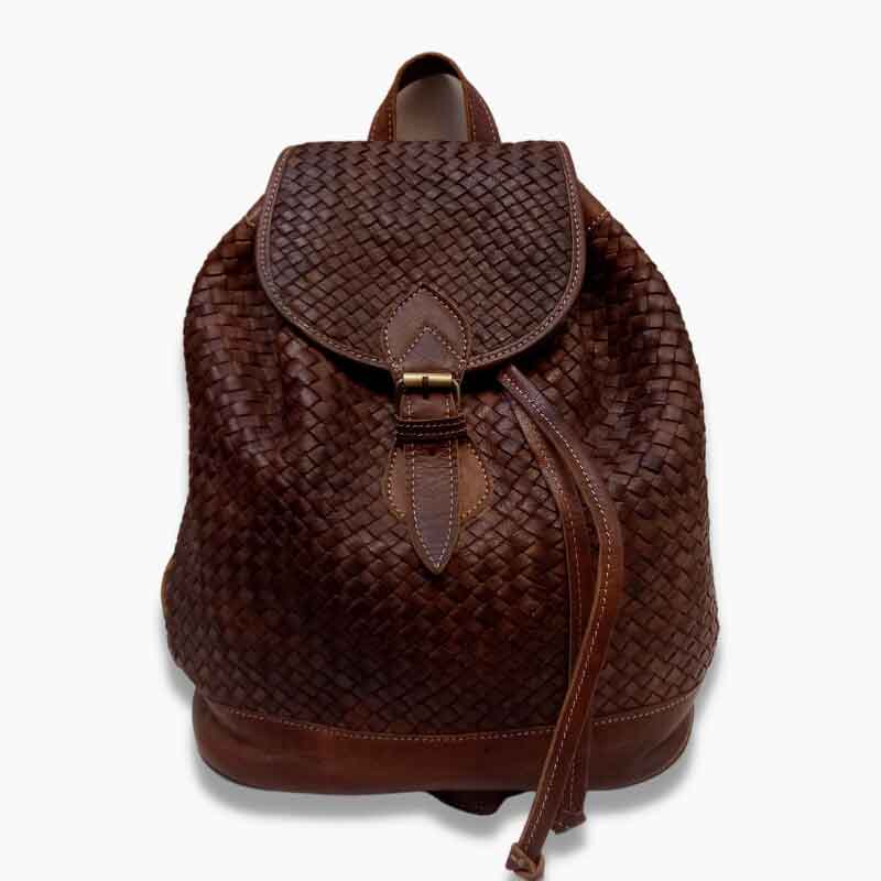 Handcrafted Moroccan leather bag purse in natural brown, featuring traditional stitching and a minimalist design, made from eco-friendly materials